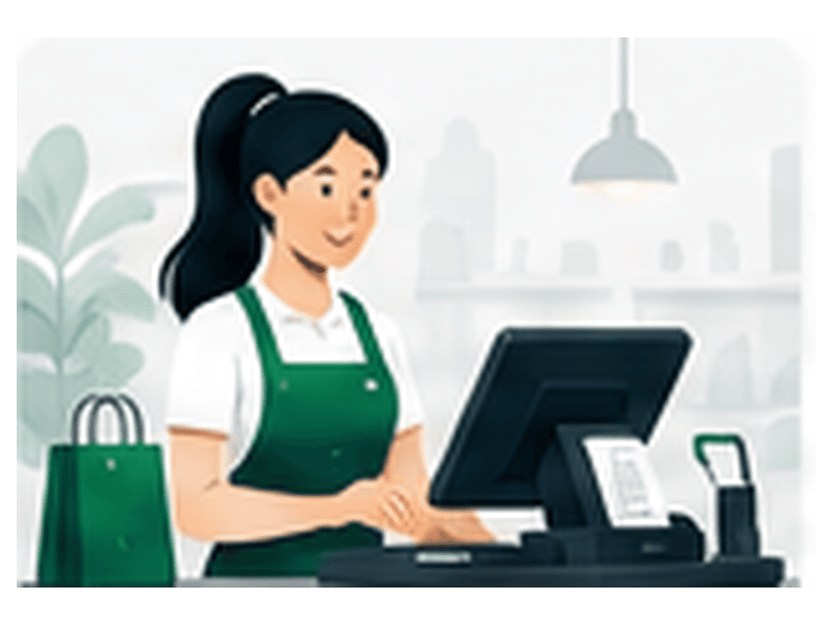 A cashier completing a sale on Wezo